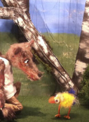 Bild von Wolf und Kücken